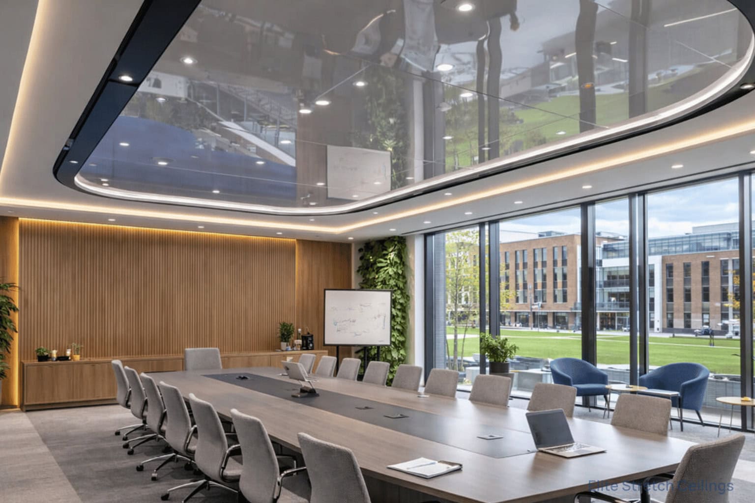 Office gloss stretch ceiling installation for a conference room.