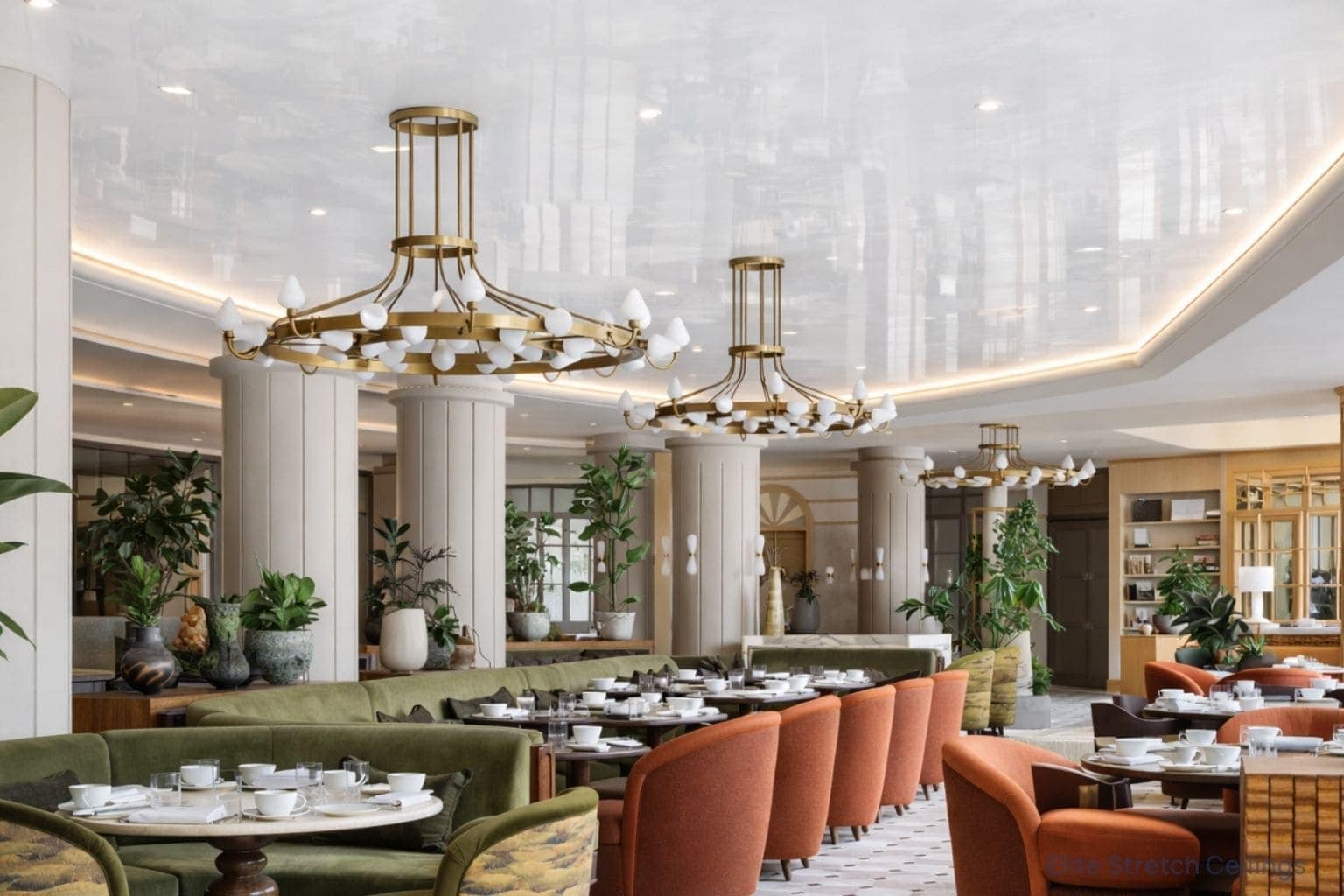 Commercial gloss stretch ceiling installation for a hotel.