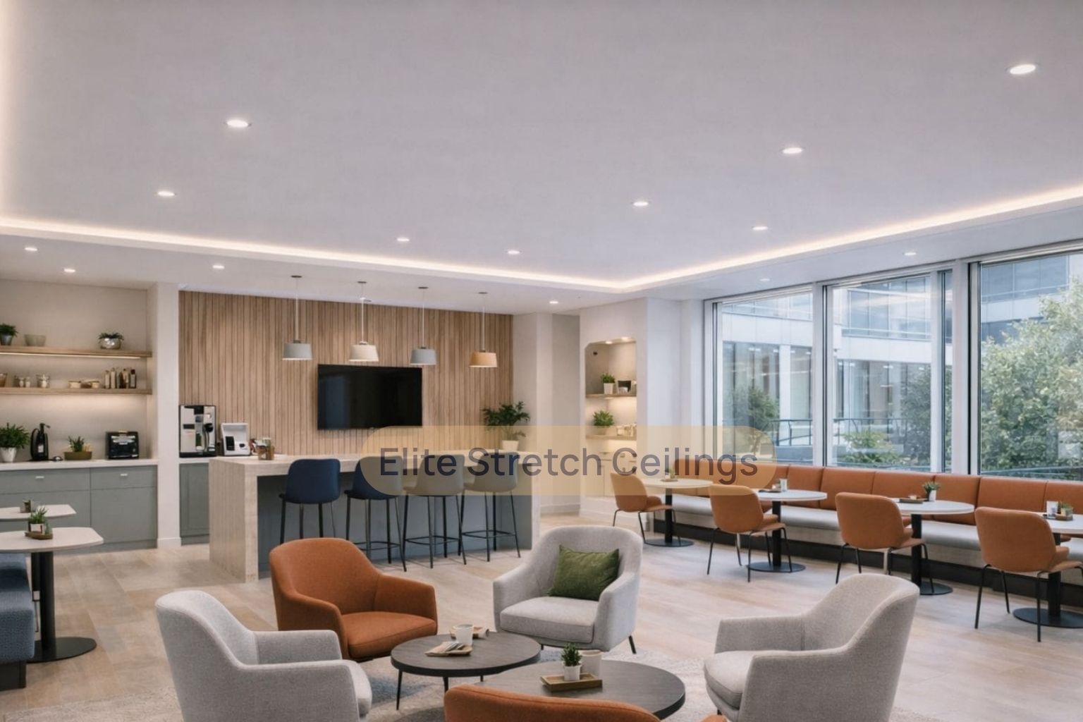 Office matte stretch ceiling installation in a breakout space.