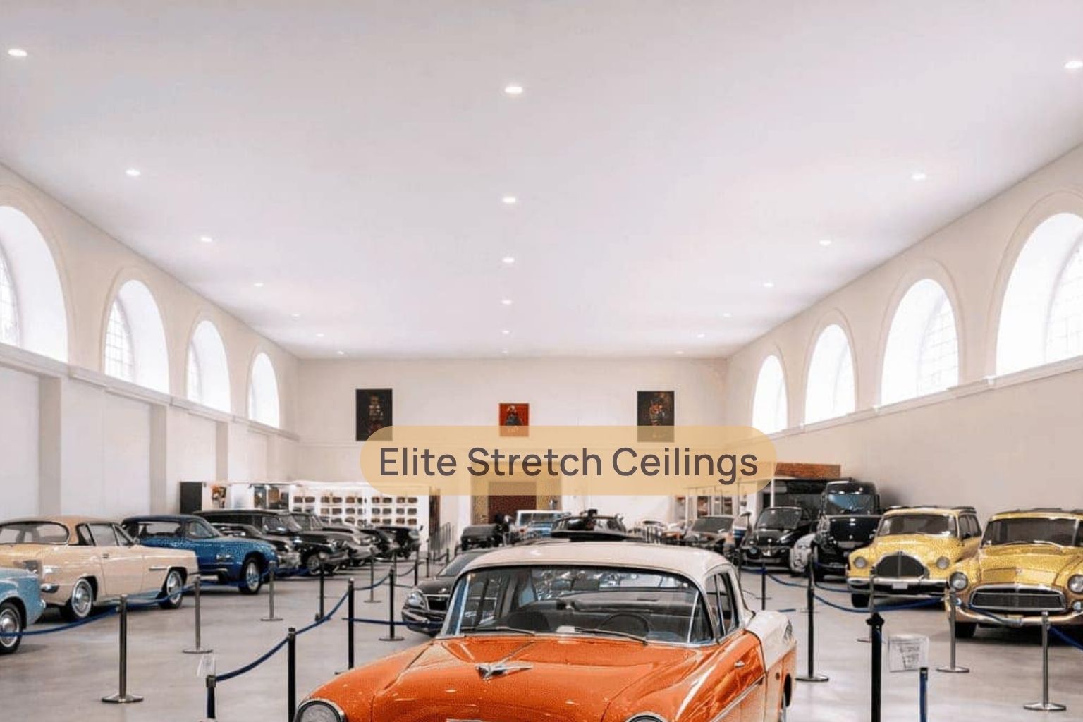 Commercial seamless stretch ceiling installation for a car museum.