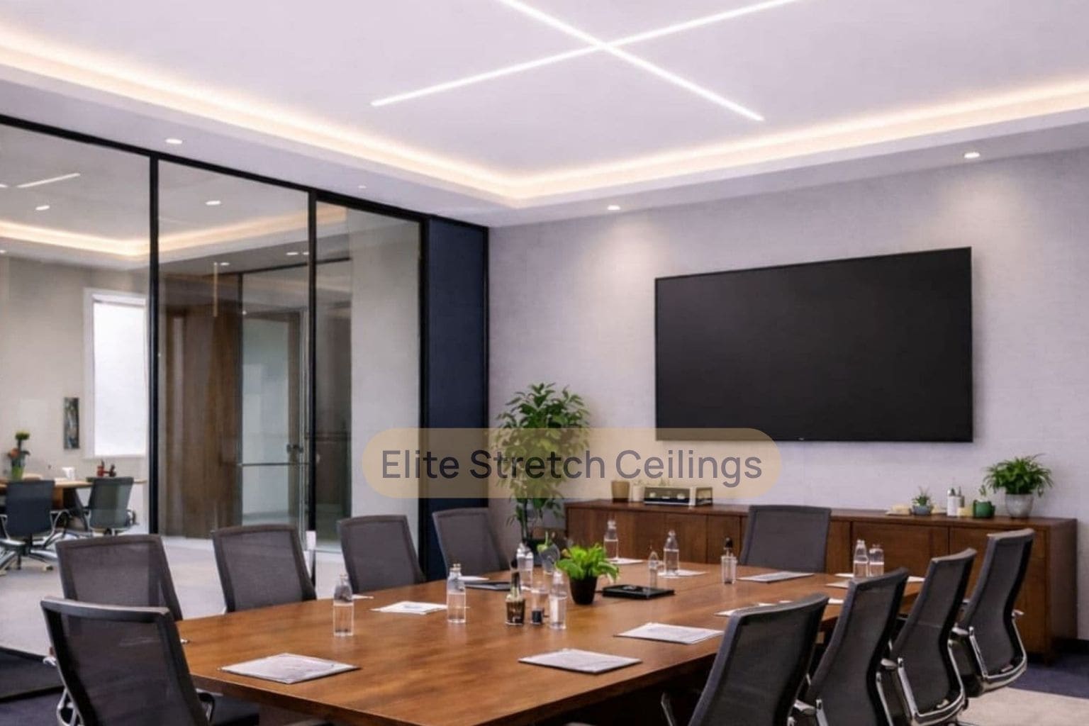 Office seamless stretch ceiling installation for a conference room.