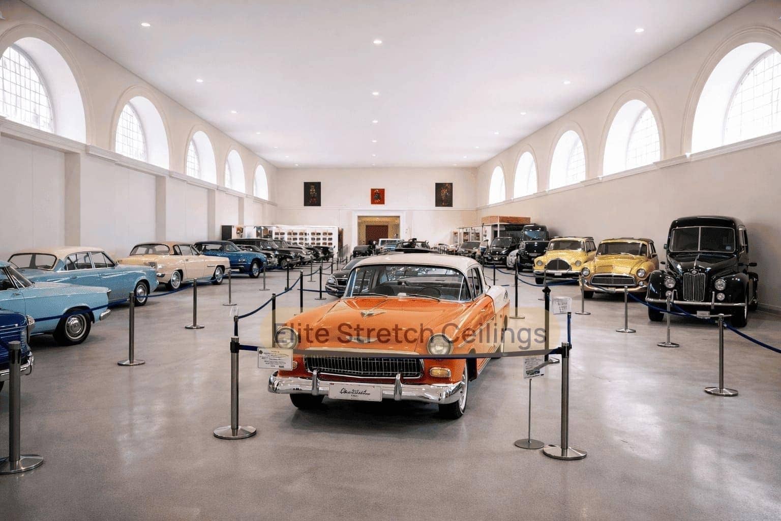 Commercial seamless stretch ceiling installation for a car museum.